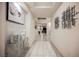 A bright hallway showcasing modern decor and a view towards the living area at 4576 Amazing View St, Las Vegas, NV 89129