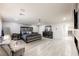 Spacious main bedroom featuring an elegant bed, contemporary furniture, and recessed lighting at 4576 Amazing View St, Las Vegas, NV 89129
