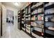 Spacious pantry filled with shelves and storage, perfect for keeping the kitchen organized and clutter-free at 4576 Amazing View St, Las Vegas, NV 89129