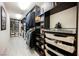 Expansive walk-in closet features ample shelving, hanging rods, and storage options for organization at 4576 Amazing View St, Las Vegas, NV 89129