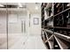 Walk-in wine cellar with a glass door, custom wine storage, and display area at 4576 Amazing View St, Las Vegas, NV 89129