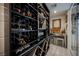 Spacious wine cellar with custom shelving to house an extensive wine collection at 4576 Amazing View St, Las Vegas, NV 89129