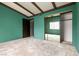 Bedroom featuring a large window, mirrored closet, and a classic beam ceiling at 4742 Obannon Dr # D, Las Vegas, NV 89102
