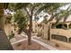 Attractive community features stucco buildings with red tile roofs and landscaped walkways at 4742 Obannon Dr # D, Las Vegas, NV 89102