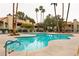 Community pool and lush landscaping offering a refreshing oasis for relaxation and recreation at 4742 Obannon Dr # D, Las Vegas, NV 89102