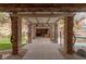 Scenic outdoor area with stone columns, a pergola, an inground pool and spa, plus beautiful landscaping at 48 Panorama Crest Ave, Las Vegas, NV 89135