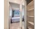 Bedroom view through closet with single bed and window with coverings at 501 Starfire Pl, Las Vegas, NV 89107
