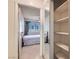 Bedroom view through closet with single bed and window with coverings at 501 Starfire Pl, Las Vegas, NV 89107