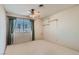 Bedroom with neutral carpeting, ceiling fan, window coverings, and closet at 501 Starfire Pl, Las Vegas, NV 89107