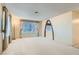 Bright living room featuring a window, archway, neutral walls and plush carpet at 501 Starfire Pl, Las Vegas, NV 89107