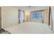 Spacious living room with neutral carpet and sun-lit windows at 501 Starfire Pl, Las Vegas, NV 89107