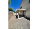 Covered backyard patio with desert-style landscaping at 5213 Castle Butte Ct, North Las Vegas, NV 89031