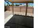 Covered backyard patio with gravel landscaping, perfect for outdoor relaxation at 5213 Castle Butte Ct, North Las Vegas, NV 89031