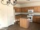 Kitchen area featuring ample cabinetry, countertops, and a functional center island at 5213 Castle Butte Ct, North Las Vegas, NV 89031