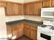 Kitchen area featuring ample cabinetry, countertops, and a functional gas range at 5213 Castle Butte Ct, North Las Vegas, NV 89031
