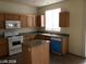 Kitchen area featuring ample cabinetry, countertops, and a functional center island at 5213 Castle Butte Ct, North Las Vegas, NV 89031