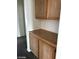 Built-in storage features wood cabinets and a spacious countertop at 5213 Castle Butte Ct, North Las Vegas, NV 89031