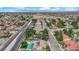 This aerial view shows a home with a pool in a maturely landscaped neighborhood at 5239 Somerset Dr, Las Vegas, NV 89120