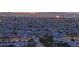 An aerial view showcasing the neighborhood and the Vegas skyline in the background at 5239 Somerset Dr, Las Vegas, NV 89120