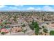 Enjoy an aerial view featuring the pool, and mature trees in the community at 5239 Somerset Dr, Las Vegas, NV 89120