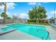 Refreshing backyard pool and spa with lush lawn, ideal for entertaining and relaxation at 5239 Somerset Dr, Las Vegas, NV 89120