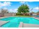 Backyard pool and spa with mature tree, creating a private and serene outdoor space at 5239 Somerset Dr, Las Vegas, NV 89120