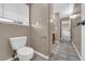 Bathroom featuring a toilet, neutral walls, tile flooring, and a window providing natural light at 5239 Somerset Dr, Las Vegas, NV 89120