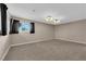 Neutral bedroom featuring carpeted floors, dark curtains and recessed lighting at 5239 Somerset Dr, Las Vegas, NV 89120
