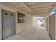 Covered patio with access door and side yard view, seamlessly blending indoor and outdoor living at 5239 Somerset Dr, Las Vegas, NV 89120