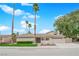 Charming single-story home with desert landscaping, lush lawn, and a spacious two-car garage at 5239 Somerset Dr, Las Vegas, NV 89120