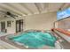 Relaxing hot tub under covered patio with ceiling fan, ideal for outdoor enjoyment at 5239 Somerset Dr, Las Vegas, NV 89120
