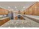 Kitchen featuring wood cabinets, granite counters, and stainless steel appliances at 5239 Somerset Dr, Las Vegas, NV 89120