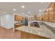 Eat-in kitchen featuring granite countertops and stainless steel appliances at 5239 Somerset Dr, Las Vegas, NV 89120