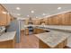 Kitchen featuring wood cabinets, granite counters, and stainless steel appliances at 5239 Somerset Dr, Las Vegas, NV 89120