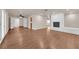 Spacious living room with updated brick fireplace, and bright neutral walls at 5239 Somerset Dr, Las Vegas, NV 89120