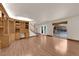 Open living room with hardwood floors, built-in shelves, and natural lighting at 5239 Somerset Dr, Las Vegas, NV 89120