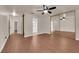 This main bedroom features wood floors, ceiling fan, and mirror sliding door closet at 5239 Somerset Dr, Las Vegas, NV 89120