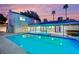 The backyard features a sparkling pool, jacuzzi, and ample patio space perfect for relaxation at 5239 Somerset Dr, Las Vegas, NV 89120