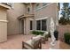 Cozy courtyard with brick flooring and seating area, perfect for enjoying quiet moments outdoors at 541 Green Sage Way, Las Vegas, NV 89138