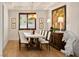 Elegant dining room featuring a stylish chandelier, artistic decor, and a bright, inviting atmosphere at 541 Green Sage Way, Las Vegas, NV 89138