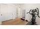 Bright workout area with wooden floors, large closet, and elliptical machine at 541 Green Sage Way, Las Vegas, NV 89138