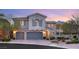 Charming two-story home with a three-car garage, well-maintained landscaping, and beautiful curb appeal at 541 Green Sage Way, Las Vegas, NV 89138