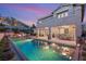 Inviting backyard with a private pool, spa, and covered patio perfect for outdoor entertaining and relaxation at 541 Green Sage Way, Las Vegas, NV 89138
