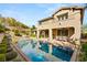 Backyard pool with patio and landscaping with view of the home's exterior at 541 Green Sage Way, Las Vegas, NV 89138