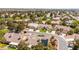 Beautiful aerial view of a suburban neighborhood with well-maintained houses and landscaped yards at 5612 Beach Mill Way, Las Vegas, NV 89130