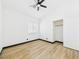 Bedroom with a large window, closet, and vinyl plank flooring at 566 Searchlight Dr, Las Vegas, NV 89110
