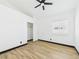 Bright bedroom with hardwood floors, built in closet, and window at 566 Searchlight Dr, Las Vegas, NV 89110