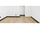 Bedroom features hardwood floors, a closet, and white walls at 566 Searchlight Dr, Las Vegas, NV 89110