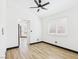 Bright room with light wood flooring and a window at 566 Searchlight Dr, Las Vegas, NV 89110