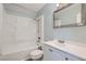 Bathroom featuring a shower-tub combo, updated vanity, and neutral color scheme at 5913 Smoke Ranch Rd # A, Las Vegas, NV 89108